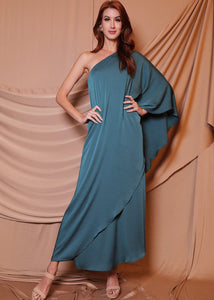 Hunter green one shoulder maxi dress. The one shoulder is timeless and falls to the wrist, keeping you covered and ready for anything that come your way.