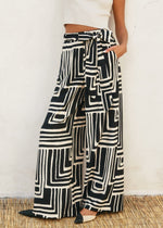 Load image into Gallery viewer, Printed viscose blend wide leg pants. Elastic waist with belt loop. Optional sash belt.
