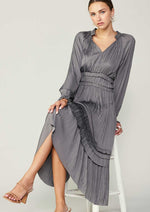Load image into Gallery viewer, Grey long sleeve split neck long dress with ruffle detail on neck and waist and hem. 
