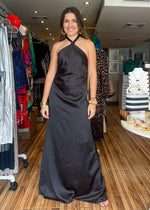 Load image into Gallery viewer, Black halter satin maxi dress. Ties in the back. Gorgeous, chic and elegant. Perfect for a lovely evening out.
