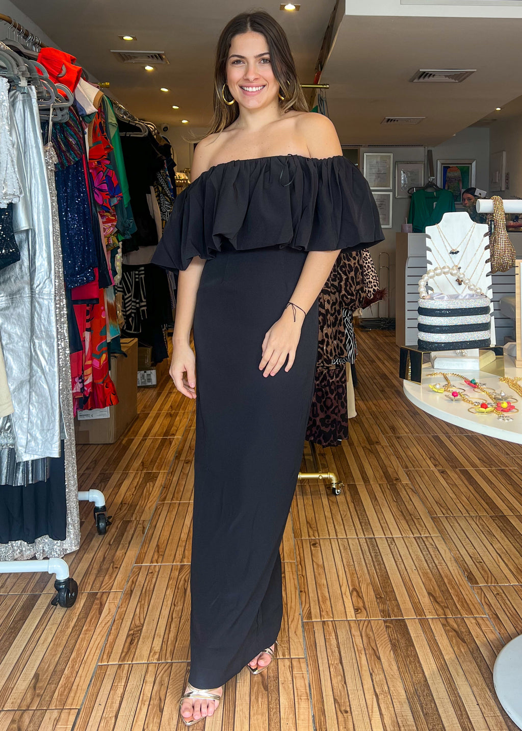 Black off the shoulder crepe maxi dress.