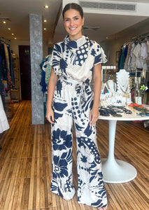 Navy/ ivory abstract floral print satin cowl neck jumpsuit.