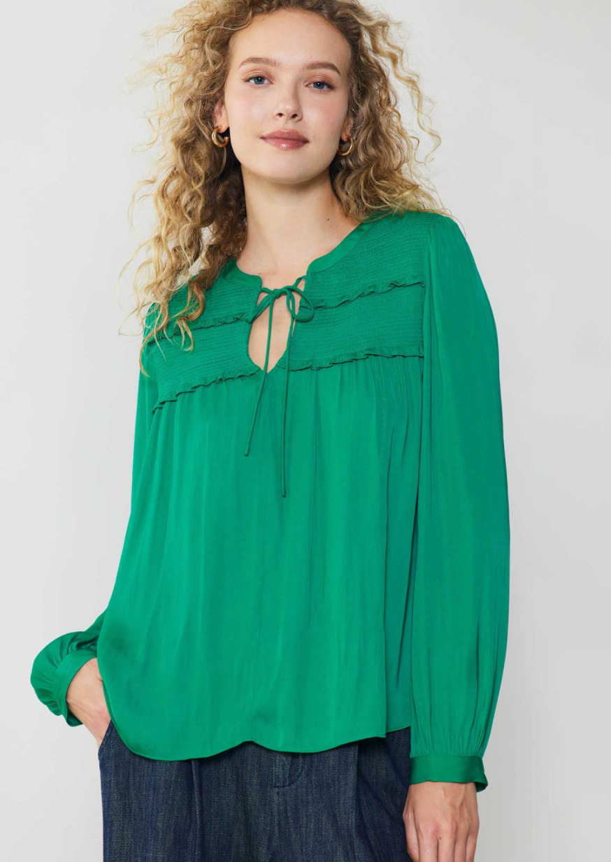 Green long sleeve split neck blouse with smocked detail on yoke &amp; cuffs with self tie.