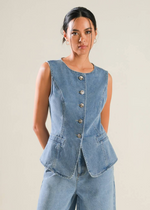 Load image into Gallery viewer, A washed denim vest featuring round neckline, button down and side pockets.
