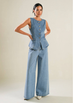 Load image into Gallery viewer, A washed denim vest featuring round neckline, button down and side pockets.
