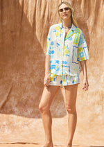 Load image into Gallery viewer, Printed shirt top and shorts set. Button up short sleeve top and elastic waist band
